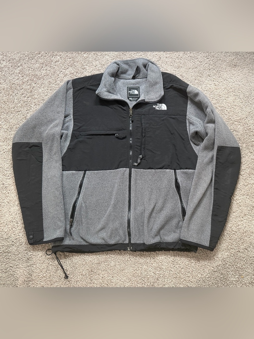 Black and Grey The North Face zip up windbreaker jacket